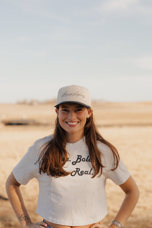 Black- cursive trucker
